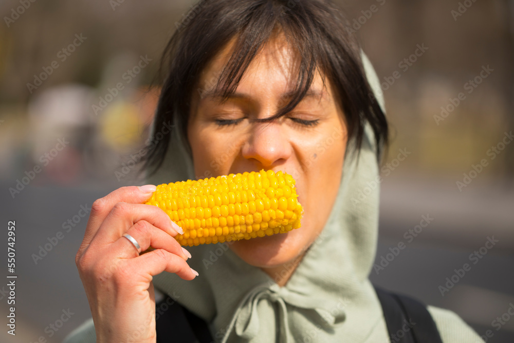 woman eating corn. Woman happy day. Eating corn. Love girl. Photo. woman eating corn. Woman happy day. Eating corn. Love girl. Photo.