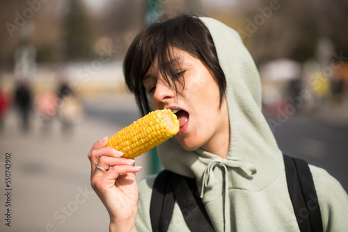 woman eating corn. Eating woman. Food. Happy day. 