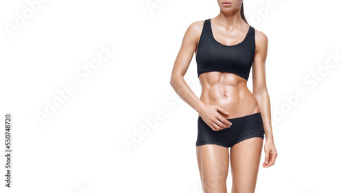 Fitness sporty woman walking on white background