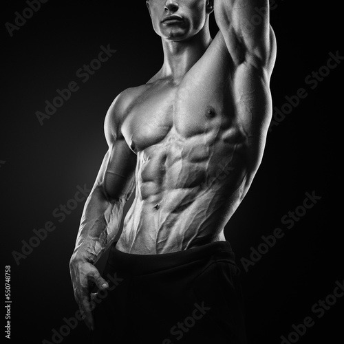 Handsome power athletic young man with great physique