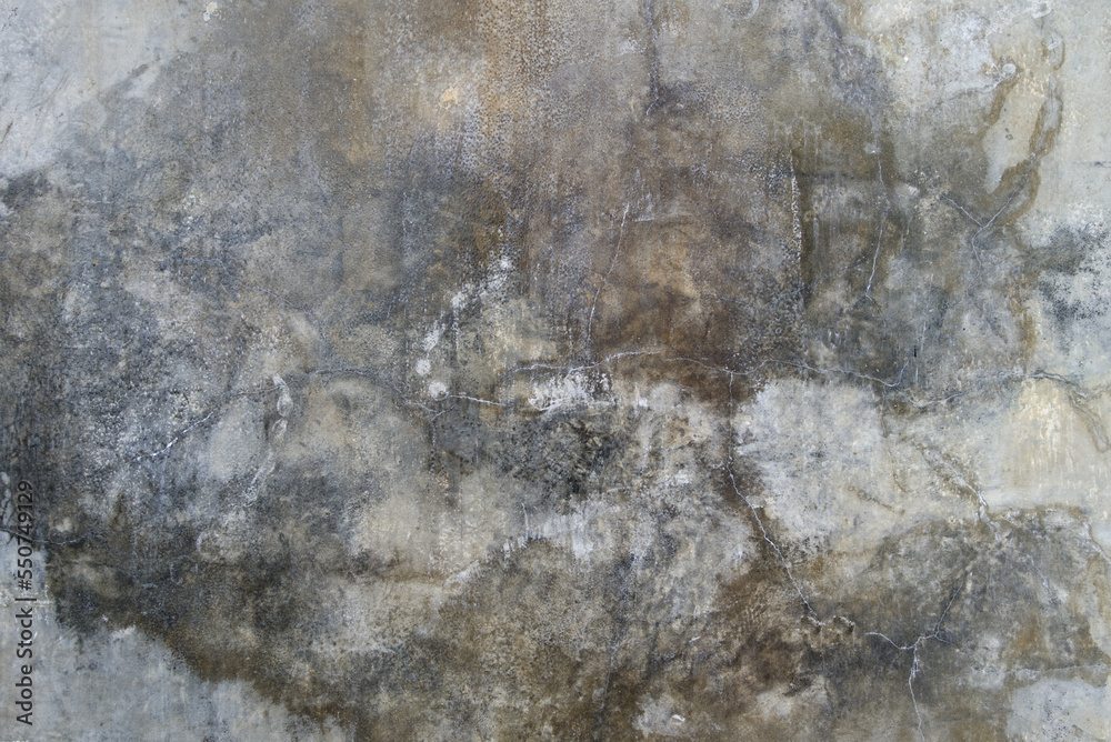 The cement flap surface has scratches, black and white stains, traces caused by plastering to create an artistic pattern