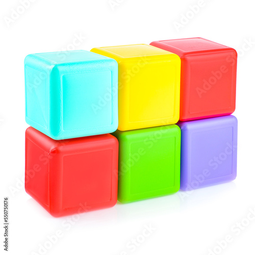 Colorful plastic cubes for children. Different geometric shapes isolated on a white background