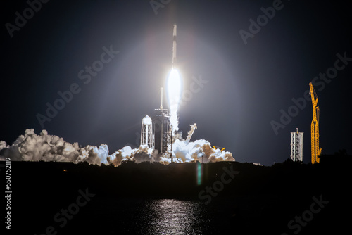 SpaceX rocket Falcon 9 rocket  capsule soars upward after lifting off from launch pad. Digitally enhanced. The elements of this image furnished by NASA.