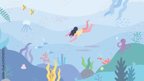 in the beautiful sea. A diver is traveling underwater. Various marine creatures in the sea.