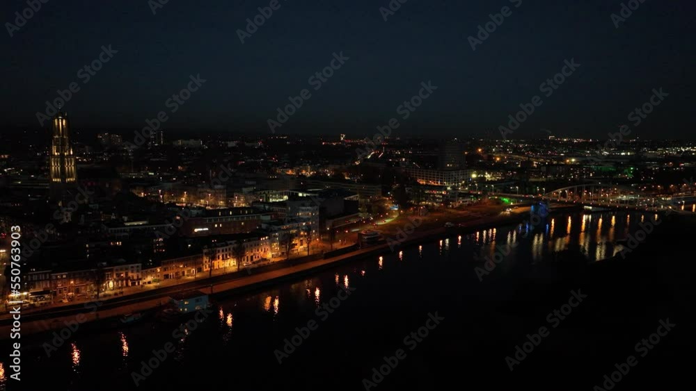 Arnhem city in the Netherlands by night Aerial drone. City center, rhine river and church, Eusebiuskerk, john frost bridge, skyline and infrastructure, city center. Arnhem city in the Netherlands by night Aerial drone. City center, rhine river and church, Eusebiuskerk, john frost bridge, skyline and infrastructure, city center.