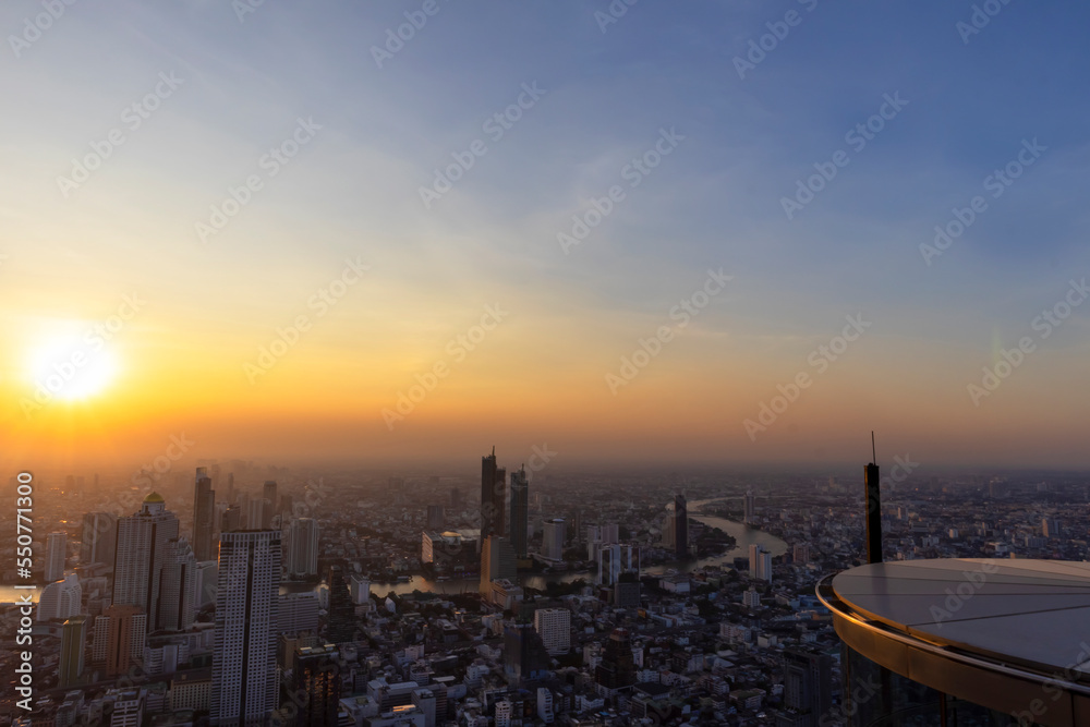 Sunset in the evening in a large metropolis,Gorgeous panorama scenic of the sunset with cloud, No focus, specifically.