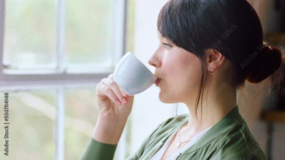 Morning, coffee and woman drinking by window to relax, chill and enjoy quality time, weekend and freedom. Thinking, reflection and girl drinking coffee, beverage and tea at home for calm mindset Morning, coffee and woman drinking by window to relax, chill and enjoy quality time, weekend and freedom. Thinking, reflection and girl drinking coffee, beverage and tea at home for calm mindset