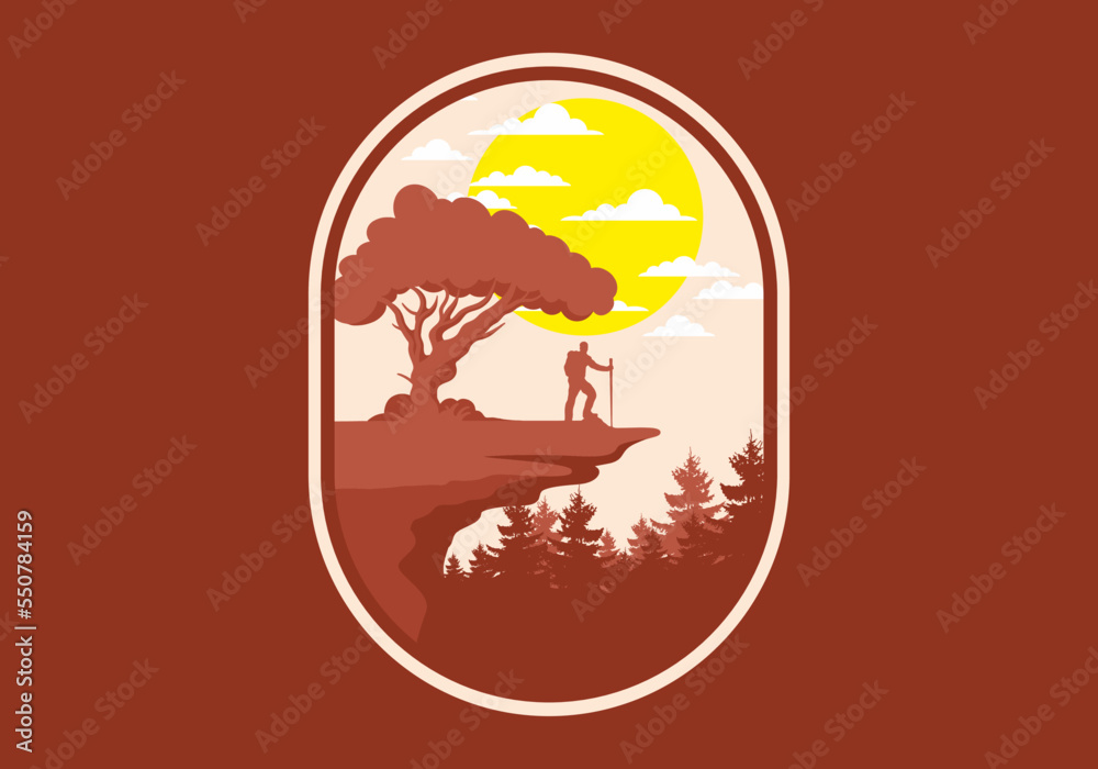 Mountain climbers standing on the edge of a cliff under a shady tree