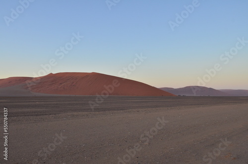 Sunset at namib desert dry pan of Sossusvlei Namib Naukluft National Park