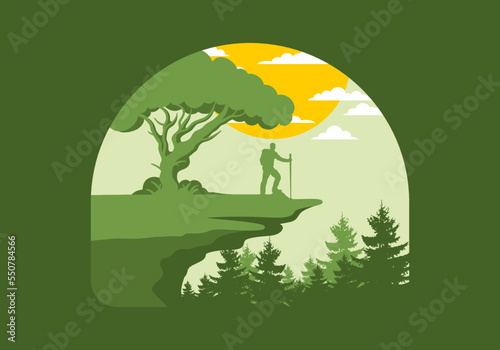 Mountain climbers standing on the edge of a cliff under a shady tree