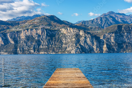 Lake Garda  Lago di Garda  and Italian Alps view from the small village of Malcesine  Verona province  Italy  Veneto  southern Europe. On background the coast of Lombardy.