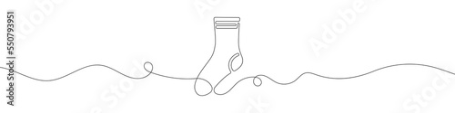 Socks icon in continuous line drawing style. Line art of socks icon. Vector illustration. Abstract background