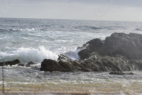 waves crashing on rocks
