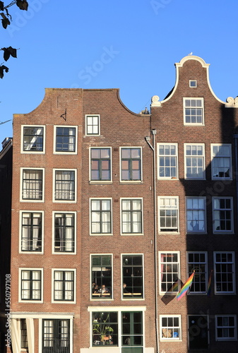 Amsterdam Traditional Brick House Facades Overlooking the Oudezijds Voorburgwal Canal, Netherlands