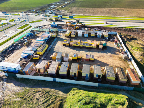 Mobile office buildings or container site office for construction site. view from above. drone photography. Household premises of builders. Construction city.