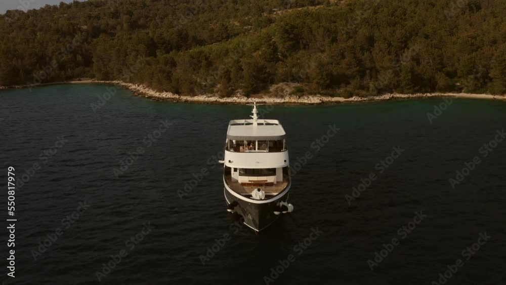 A beautiful yacht anchored on a wonderful sea coast. A beautiful yacht anchored on a wonderful sea coast.
