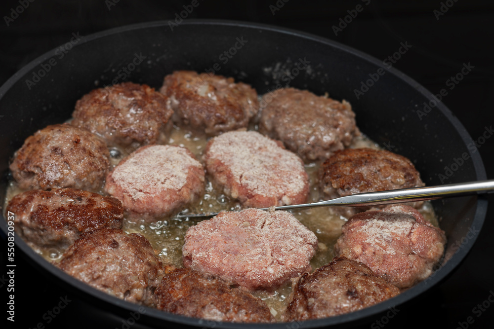 pan full of delicious cutlets pan full of delicious cutlets