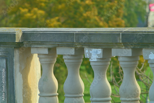 Old style concrete bridge railing.