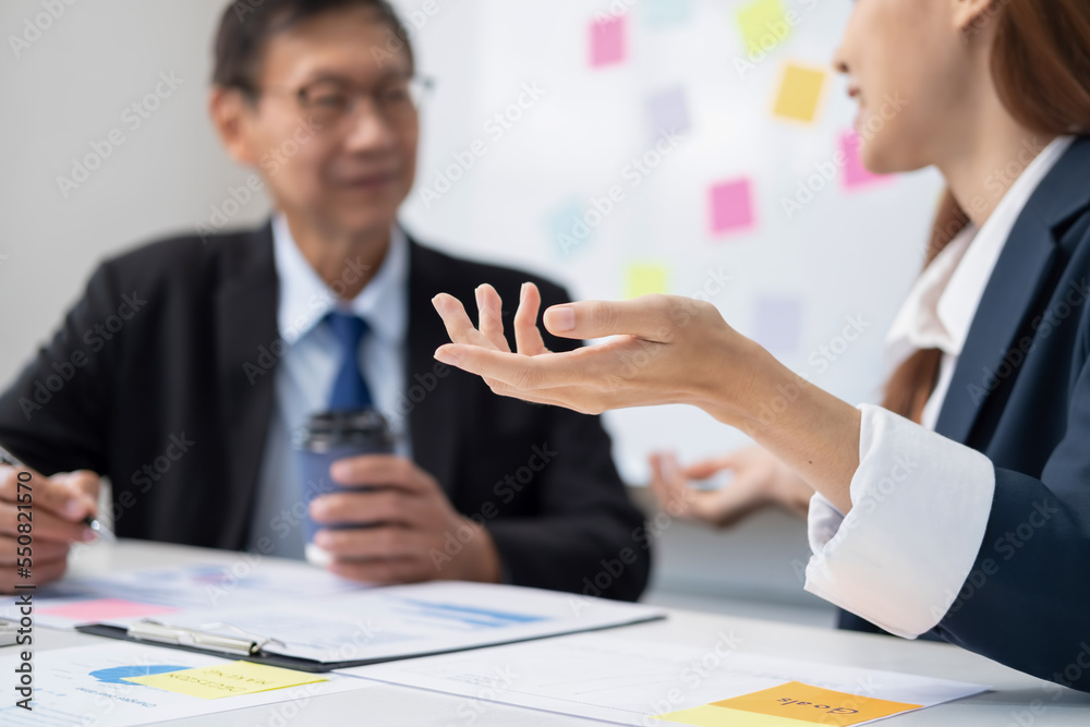 Administrator business man financial inspector and secretary making report calculating balance. Internal Revenue Service checking document.