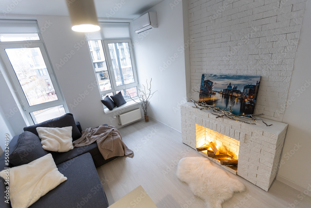 Fototapeta premium Luxury Loft Living Room Interior, Apartments with a fireplace