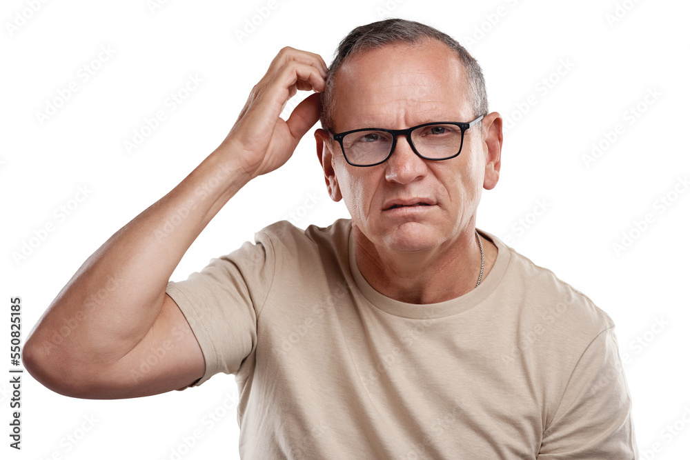 PNG shot of a handsome mature man standing against a grey background in the studio and scratching his head in confusion