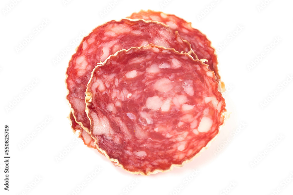 Slices of salami sausage on a white background Slices of salami sausage on a white background
