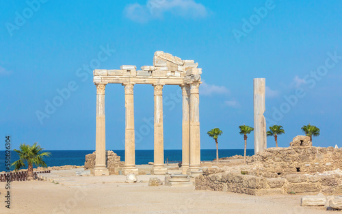 The ruined temple of Apollo, the God of sunlight. in Side (Turkey) with a stone-cut relief on the frieze. Famouse tourist destination. History, art or architecture concept