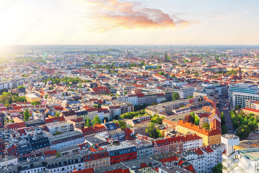 Sunset panorama of Berlin, colorful roofs of the city, Germany