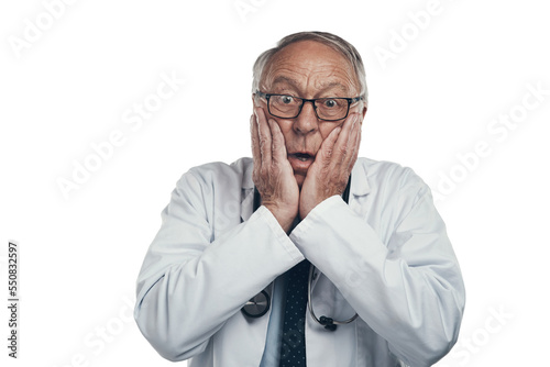 PNG shot of an elderly male doctor in a studio against a grey background