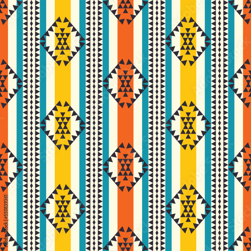 Ethnic colorful stripes pattern. Vector aztec Navajo colorful stripes seamless pattern background. Ethnic southwest pattern for fabric, textile, interior decoration elements, upholstery, wrapping.