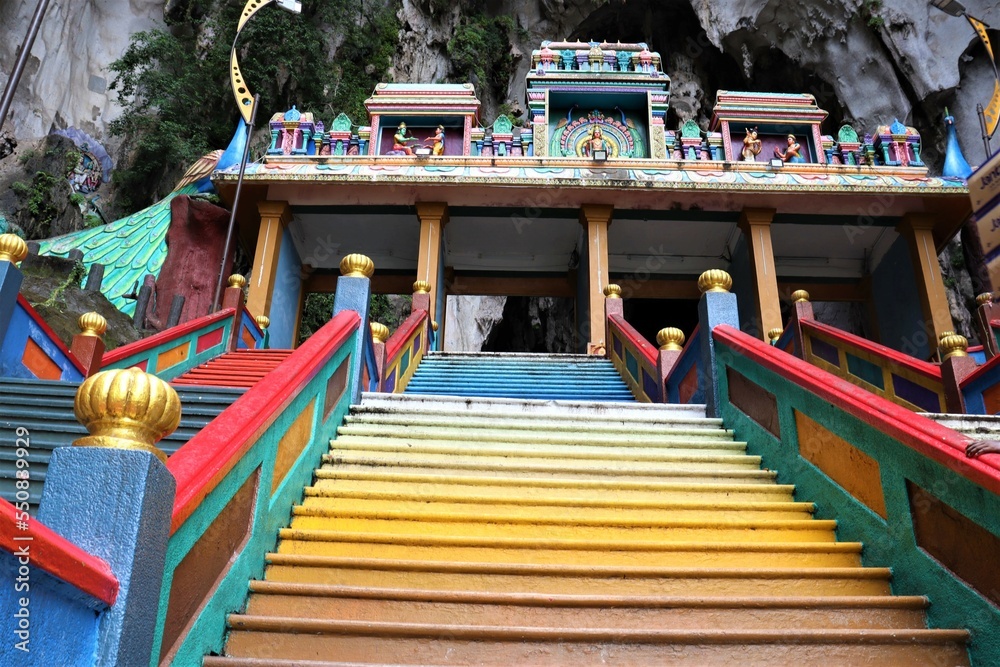 temple next to a city in Malaysia temple next to a city in Malaysia