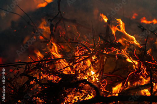 Big bond fire with a lot of smoke and open flames