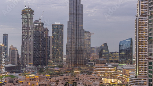 Dubai Downtown day to night transition timelapse with tallest skyscraper and other towers photo