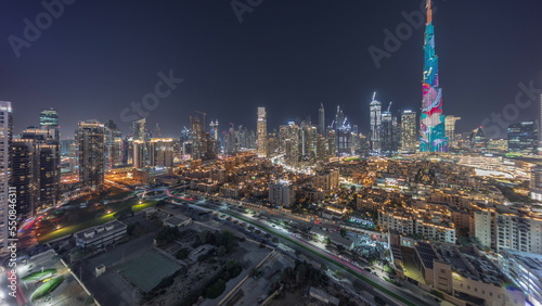 Wallpaper Mural Dubai Downtown night timelapse with tallest skyscraper and other towers Torontodigital.ca