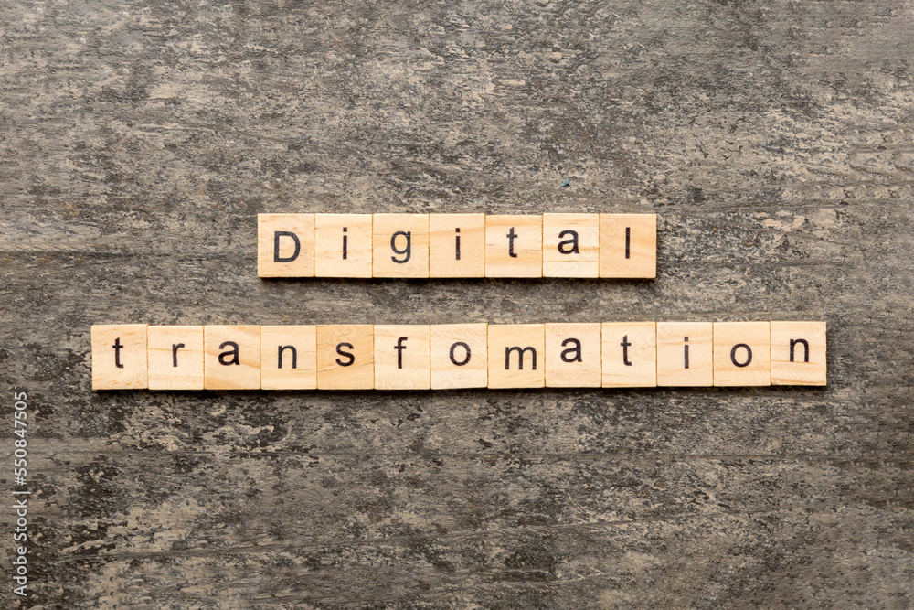 digital transformation word written on wood block. digital transformation text on cement table for your desing, concept digital transformation word written on wood block. digital transformation text on cement table for your desing, concept