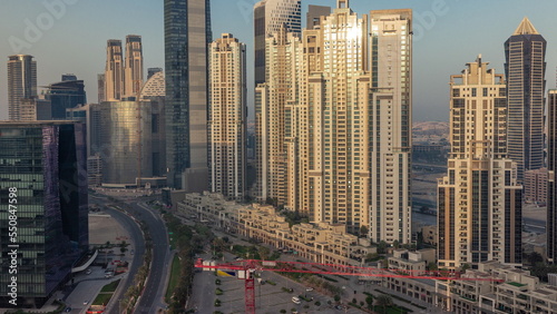 Bay Avenue during sunrise with modern towers in Business Bay aerial timelapse  Dubai