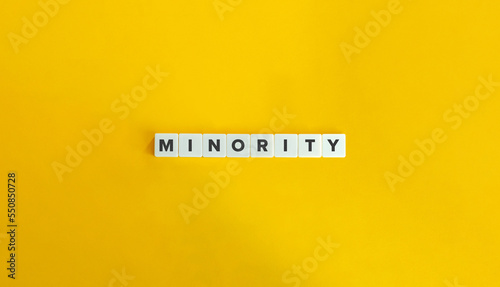 Minority Word on Block Letter Tiles on Yellow Background. Minimal Aesthetics.