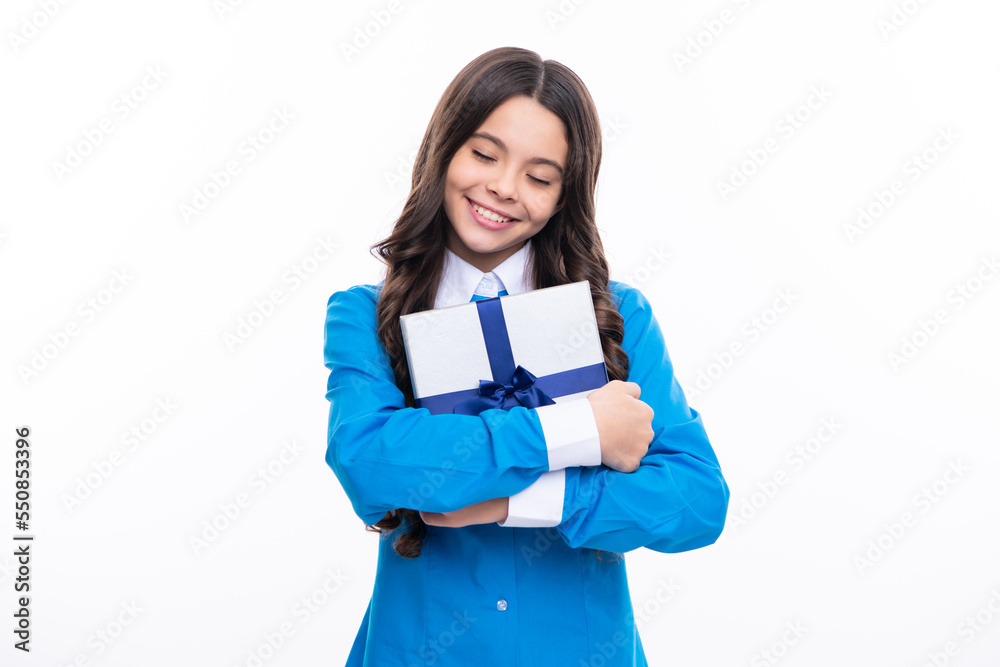 Teenager child holding gift box on white isolated background. Gift for kids birthday. Christmas or New Year present box. Valentines day. Teenager child holding gift box on white isolated background. Gift for kids birthday. Christmas or New Year present box. Valentines day.