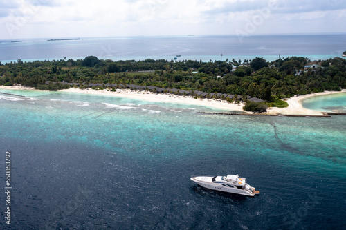 Aerial View, Asia, Indian Ocean, Maldives, Lhaviyani Atoll, Kuredu, Luxury Motor Yacht offshore © David Brown