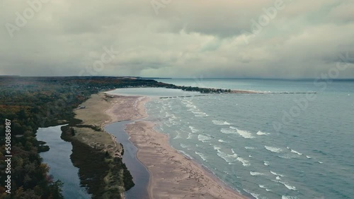 Wallpaper Mural Drone pan from small village to lake superior Torontodigital.ca