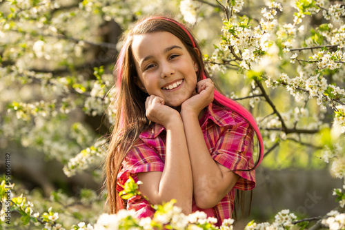 beautiful girl with a beautiful smile, nine-year-old girl photo