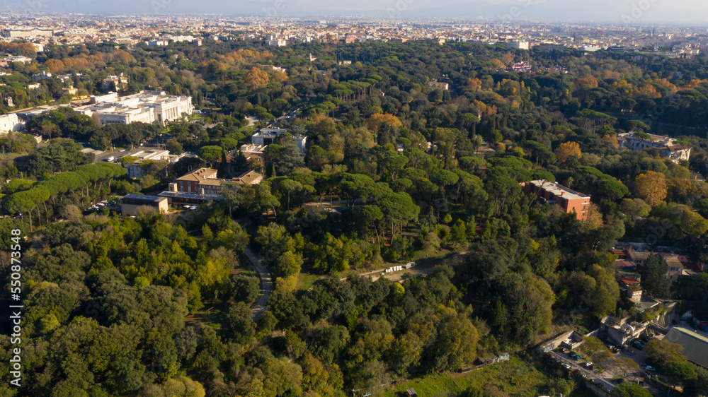 Aerial view of Villa Borghese, a landscape garden in Rome, Italy. In the park there are buildings, museums and attractions. 