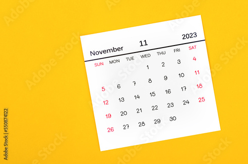 The November 2023 Monthly calendar for 2023 year on yellow background.