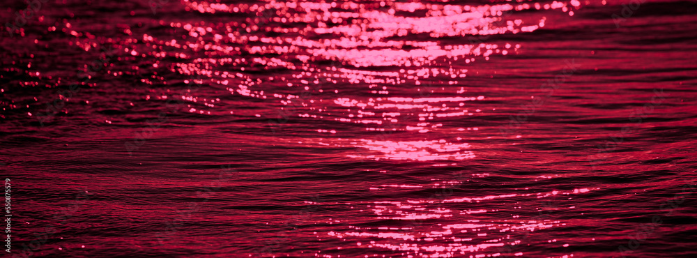 Surface water of sea or ocean at sunrise time with magenta light tone. Surface water of sea or ocean at sunrise time with magenta light tone.