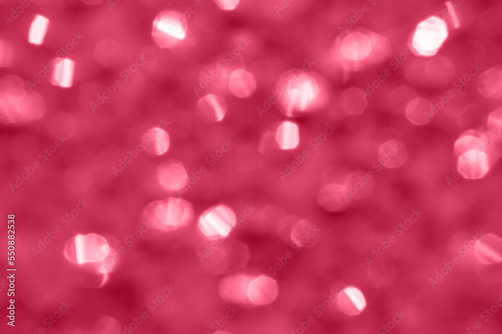 Beautiful abstract pattern with festive magenta bokeh, trendy color of year 2023. Bright blurred background. Defocus texture of celebration glitter decor Beautiful abstract pattern with festive magenta bokeh, trendy color of year 2023. Bright blurred background. Defocus texture of celebration glitter decor