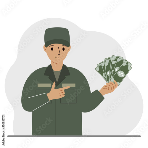 Military man holds a lot of money in his hand. The concept of payment for military service or service in the army under a contract.