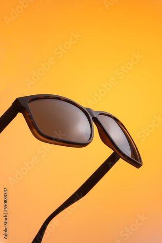 Sunglasess on color background, summer mood