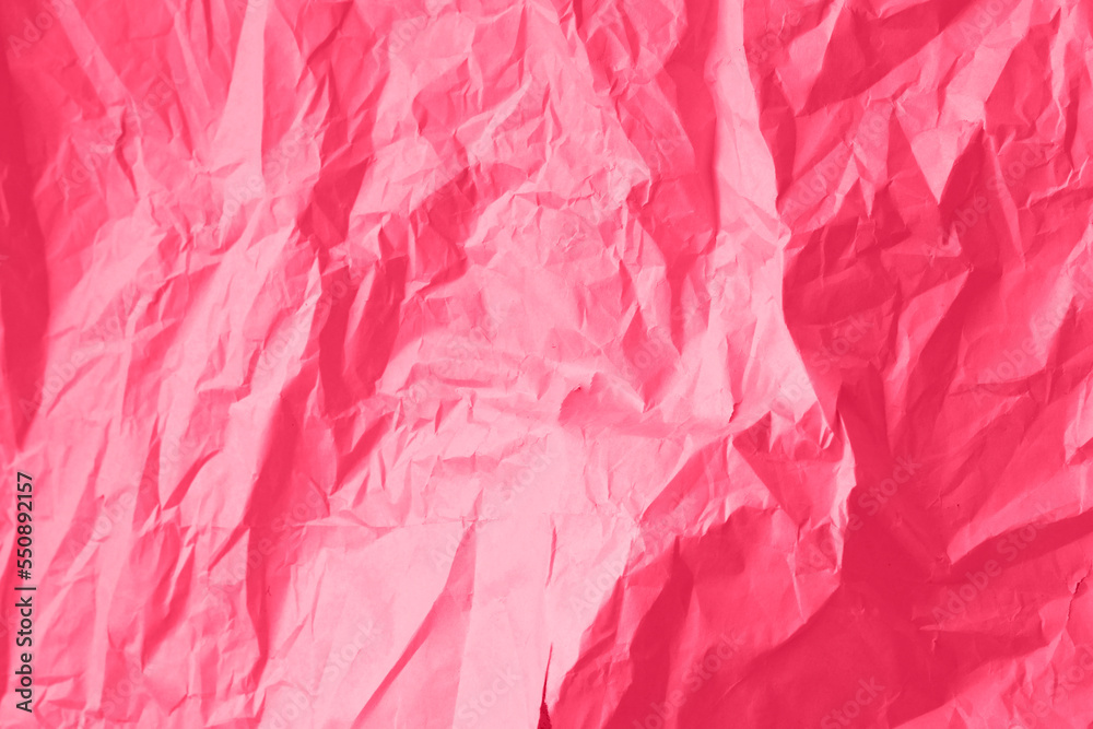 Crumpled paper Viva Magenta color of the year 2023. Texture crumpled paper for your design. Copy space. Viva Magenta color paper. Crumpled paper Viva Magenta color of the year 2023. Texture crumpled paper for your design. Copy space. Viva Magenta color paper.
