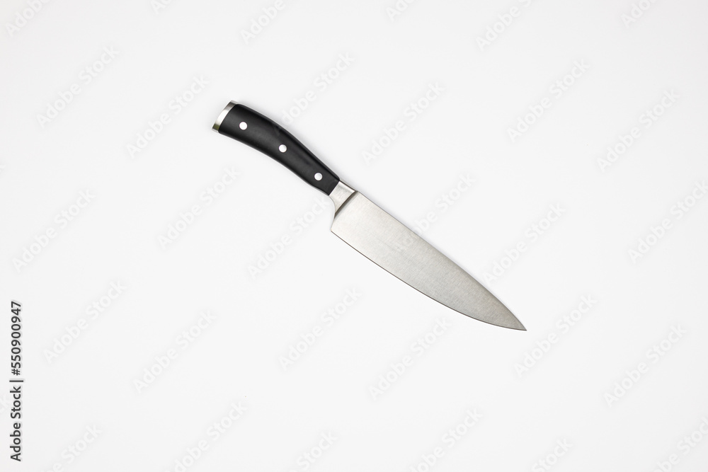 Big Cooking Knife isolated above white background Big Cooking Knife isolated above white background