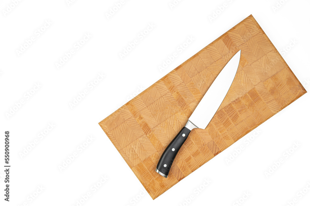 Cook Knife on the wooden endgrain cutting board above white background Cook Knife on the wooden endgrain cutting board above white background